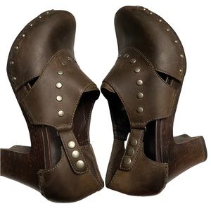Dansko women’s Ryder studded brown heeled bootie clogs.